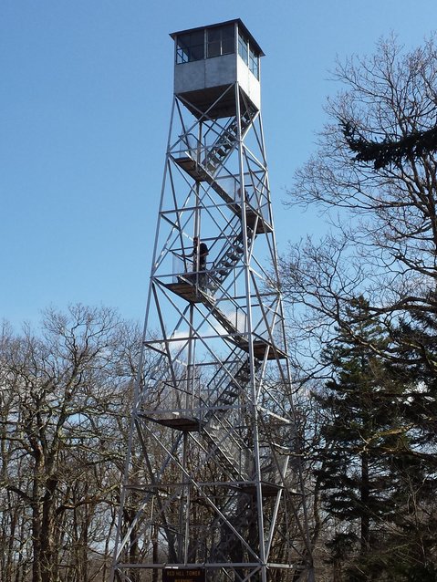 The Red Hill fire tower in Denning, near Claryville. Once, spotters watched for forest fires from towers like this. (During wartime, spotters watched for enemy planes, too.) ..The Red Hill tower is 60 feet tall and was built in 1921. As with all the Catskills fire towers, it was used less over time; fire-spotting from the air was more efficient. The tower finally closed in 1990...
